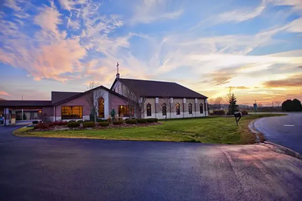 A large church with a lot of windows and doors